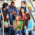 teens sitting on stairs