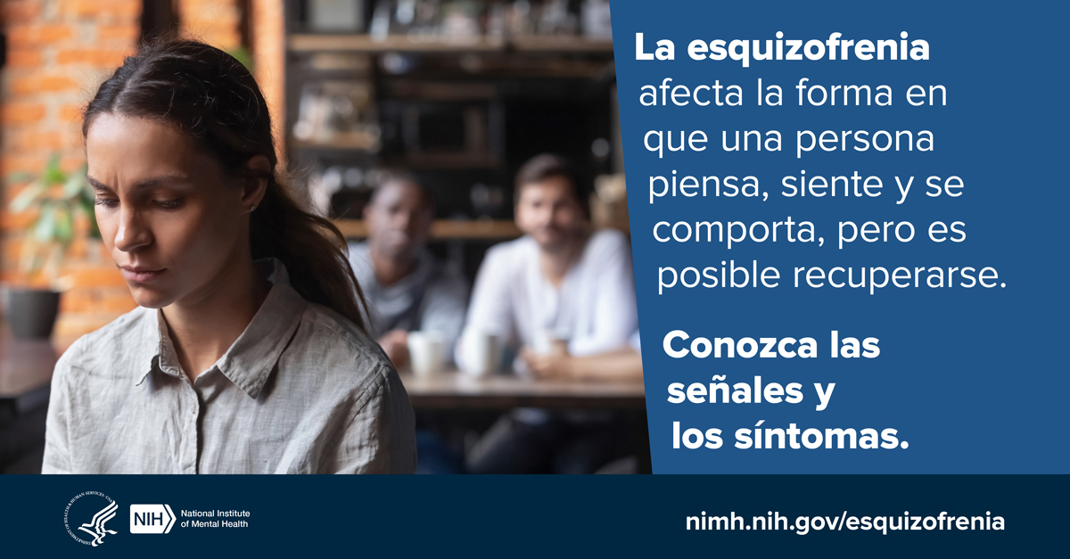 Una joven está sentada sola en una cafetería y atrás hay un grupo de personas sentadas juntas . A la par hay un mensaje que dice "La esquizofrenia afecta la forma en que una persona piensa, siente y se comporta, pero es posible recuperarse". 