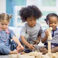 Toddlers playing with blocks