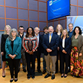 NIMH leadership and presenters posing for a group photo at NIMH's inaugural 75th Anniversary symposium.